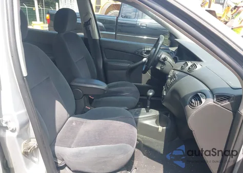 2001 Ford Focus Se z USA, uszkodzony, nr VIN 1FAFP34371W174955